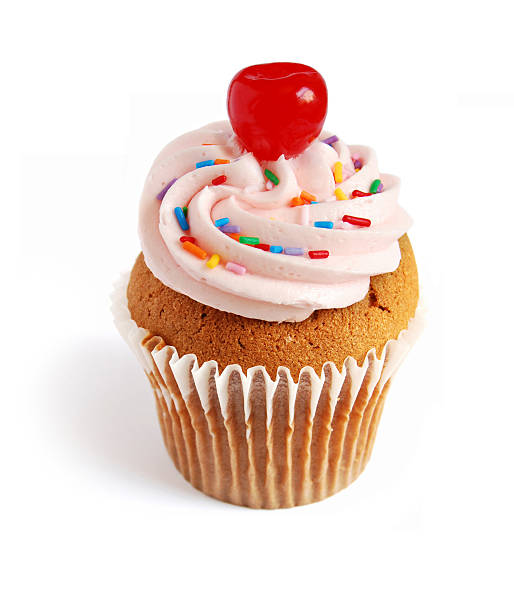 Cupcake with multi colored spinkles and cherry on top